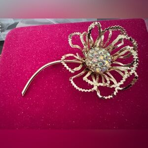 Elegant Gold Floral Brooch with Crystal Accents